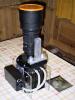 camera equipped for outdoor use with tele lens and little air dryer
